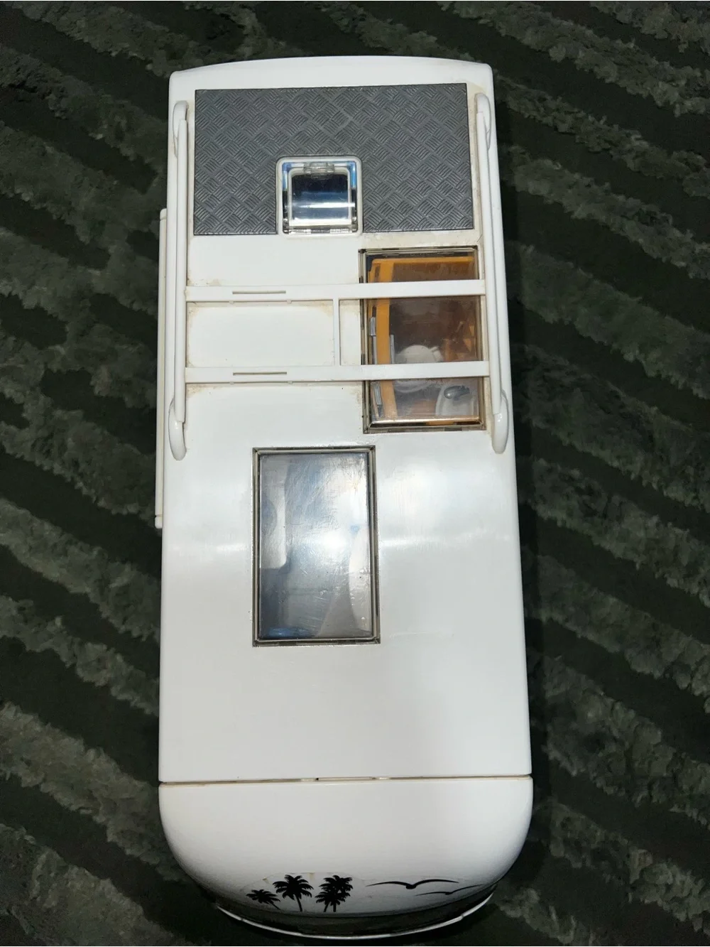 White Toy RV Bus with Palm Decal